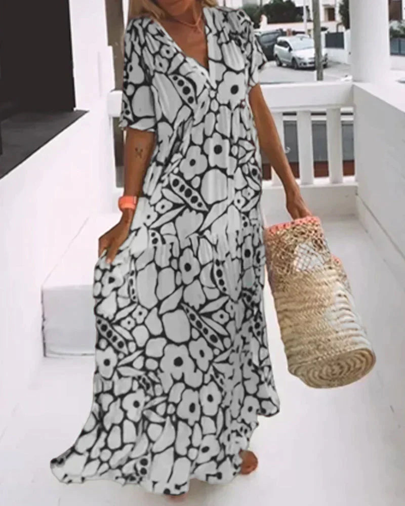 Florine™ | Robe d'été légère à col en V – fraîcheur, liberté et style sous le soleil